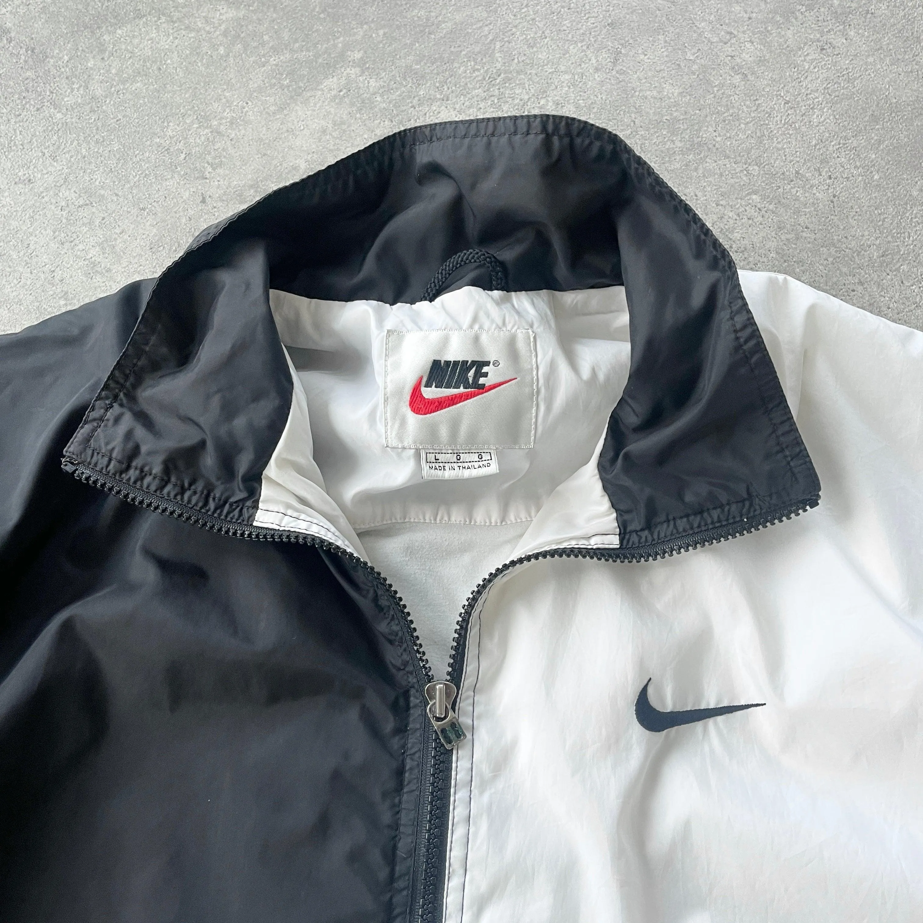 Nike 1990s lightweight embroidered swoosh shell jacket (L)